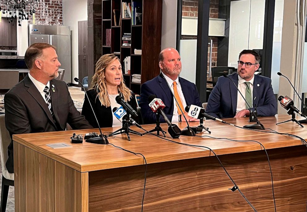 PHOTO: Shari Foltz, second left, speaks while her husband Cory Foltz, left, sit next to attorneys Rex Elliott, second right, and Sean Alto in a press conference, Jan. 23 2023, in Bowling Green, Ohio.