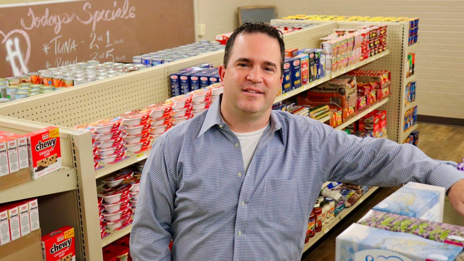 PHOTO: Anthony Love, principal at Linda Tutt High School in Sanger, Texas, stands inside the student-run grocery store.