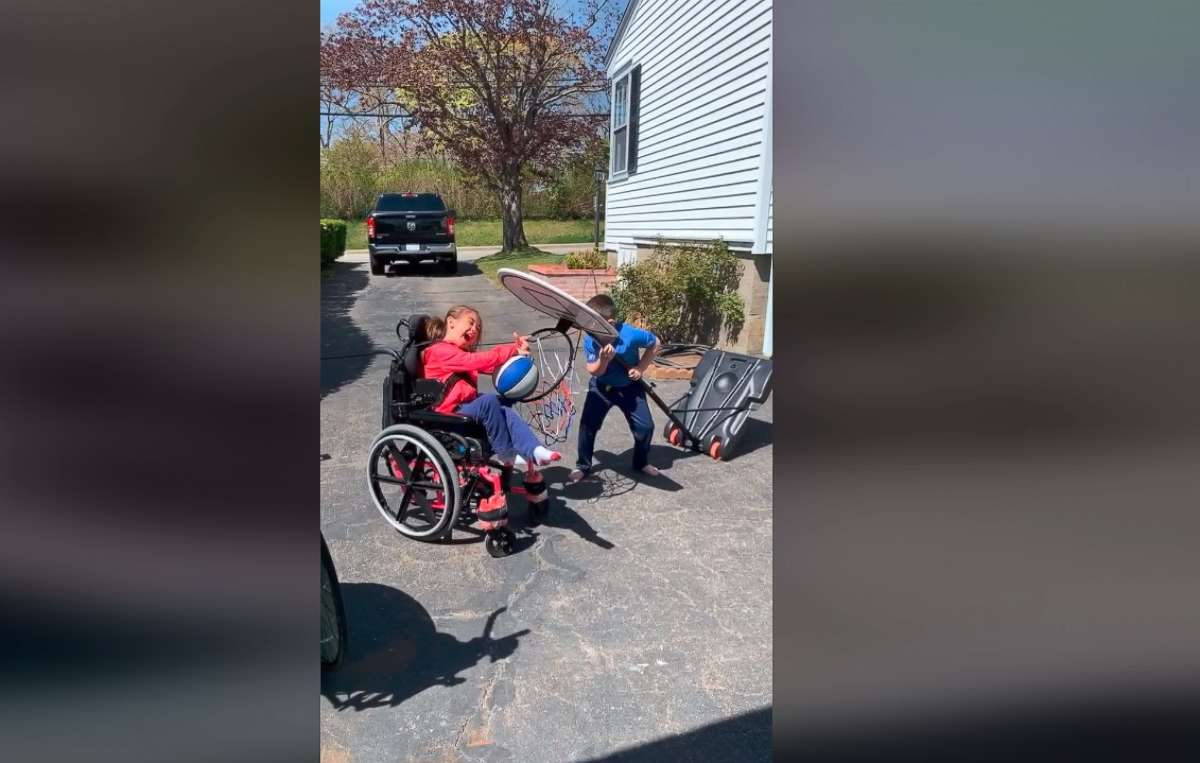 PHOTO: Viewers were moved in May 2020 by a heartwarming video of 8-year-old Tomas MacCurtain helping his sister Abby MacCurtain, 9, slam dunk a basketball. Over 8 million watched after dad Greg MacCurtain posted the  footage of his kids onto Facebook.