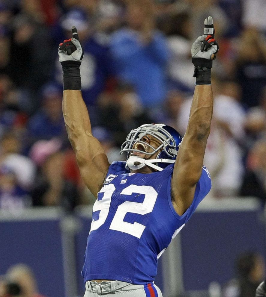 PHOTO: In this Sept. 30, 2007 file photo Michael Strahan of the New York Giants celebrates at Giants Stadium in East Rutherford, N.J.