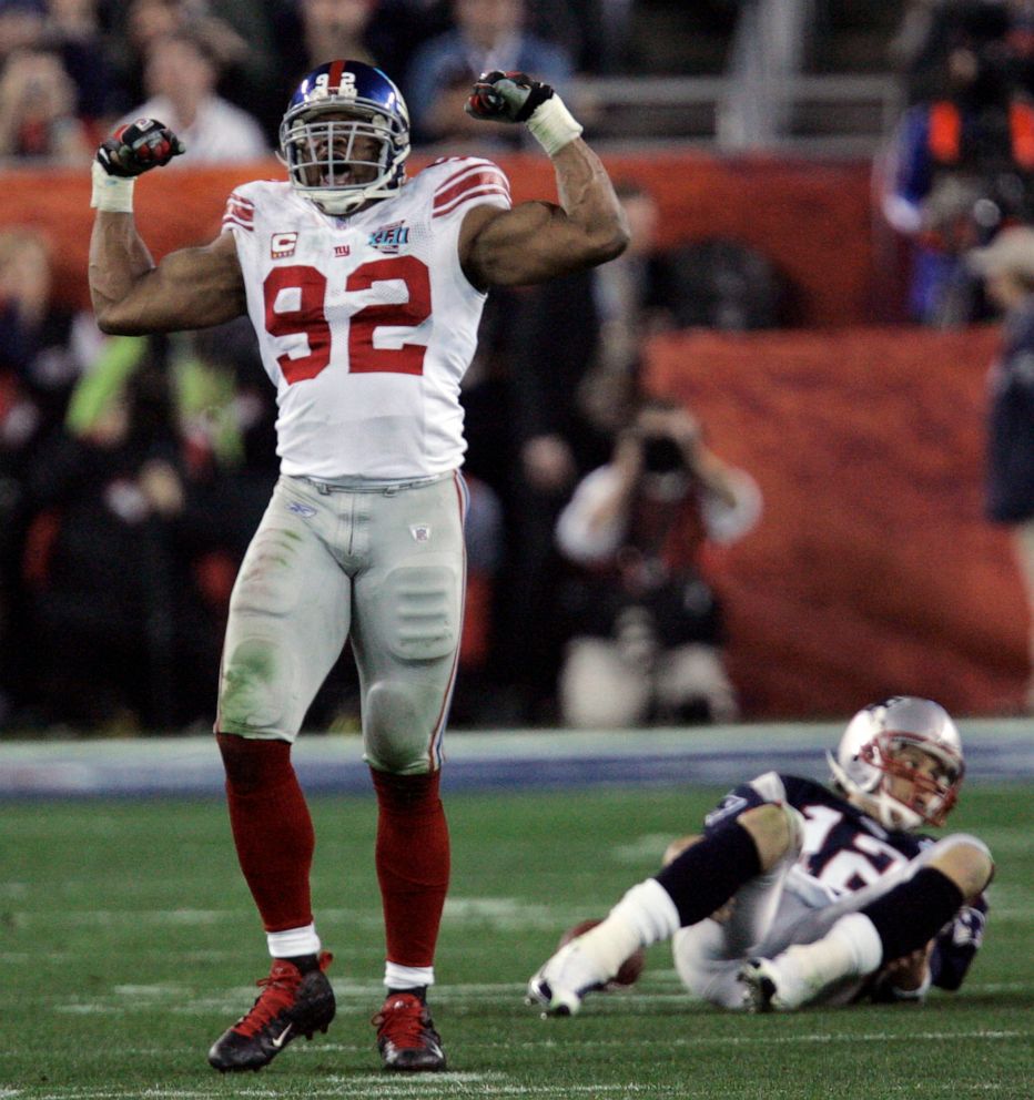 PHOTO: In this Feb. 3, 2008 file photo New York Giants Michael Strahan reacts after sacking New England Patriots quarterback Tom Brady  during the Super Bowl XLII football game at University of Phoenix Stadium in Glendale, Ariz.