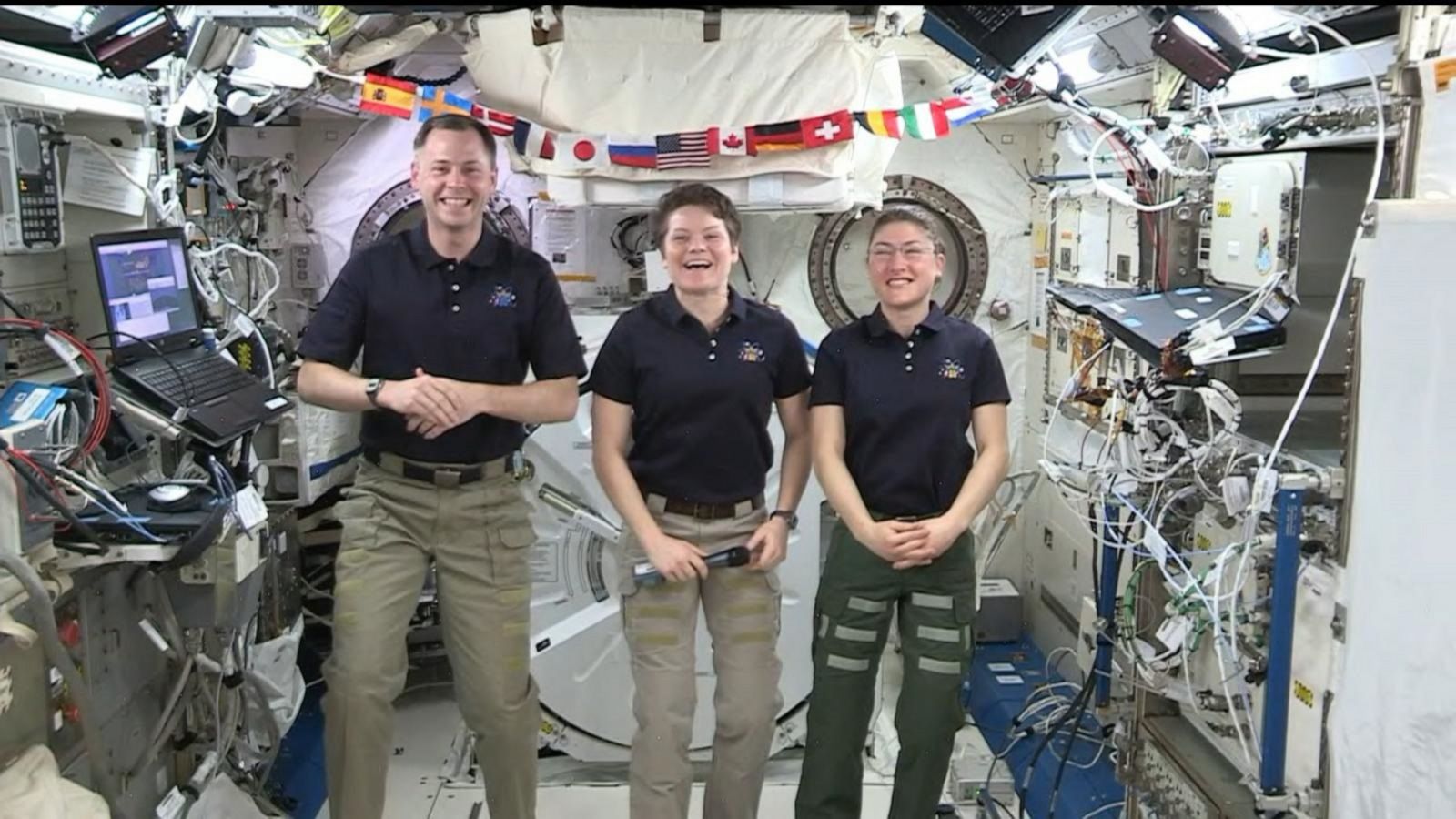 PHOTO: Astronauts Nick Hague, Anne McClain, center, and Christina Koch speak on board the International Space Station.