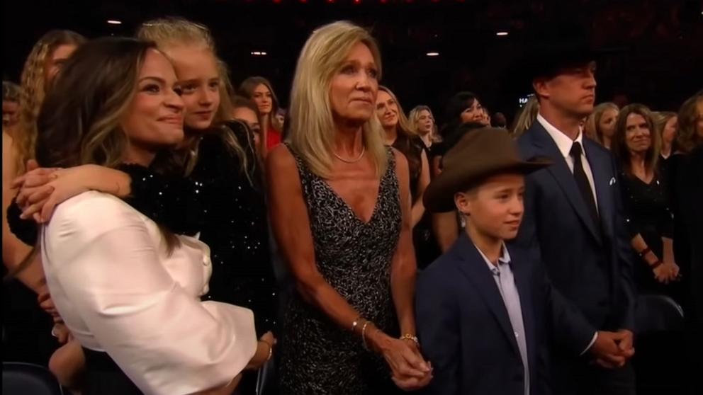 PHOTO: George Strait's family watches as Strait accepts the CMA Lifetime Award, Nov. 20, 2024, in Nashville, Tenn.