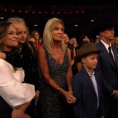 PHOTO: George Strait's family watches as Strait accepts the CMA Lifetime Award, Nov. 20, 2024, in Nashville, Tenn.