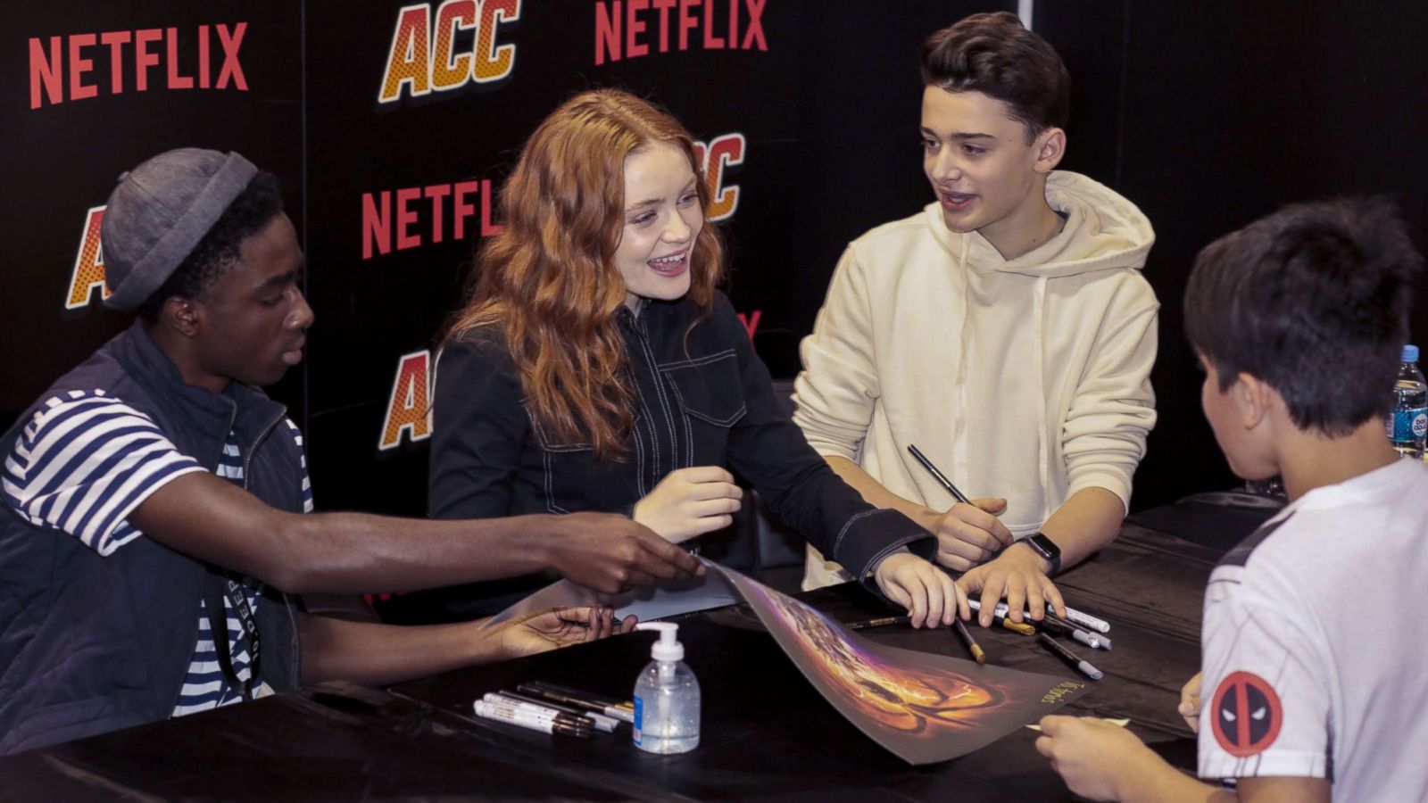 PHOTO: From left, Caleb McLaughlin, Sadie Sink and Noah Schnapp sign autographs as part of the Stranger Things meet and greet at the Argentina Comic Con 2018 at Costa Salguero, Dec. 08, 2018 in Buenos Aires, Argentina.