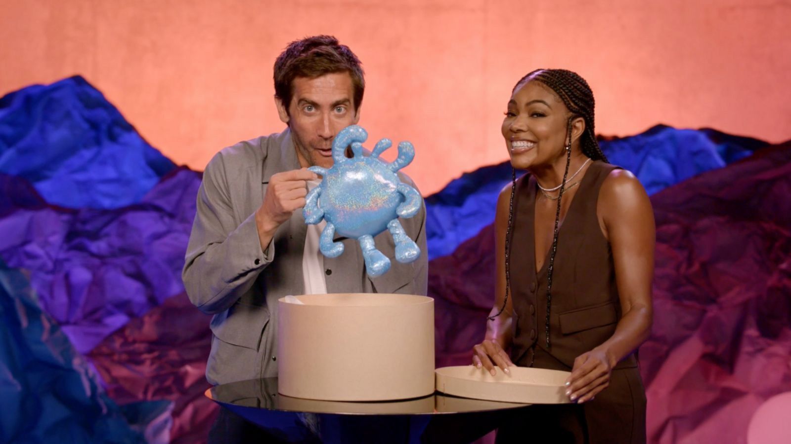 PHOTO: Jake Gyllenhaal and Gabrielle Union unbox ‘Strange World’ products.