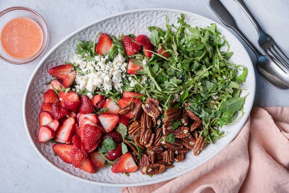 PHOTO: A strawberry and arugula salad with pecans.