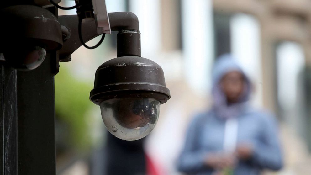 PHOTO: A video surveillance camera hangs from the side of a building, May 14, 2019, in San Francisco, California.