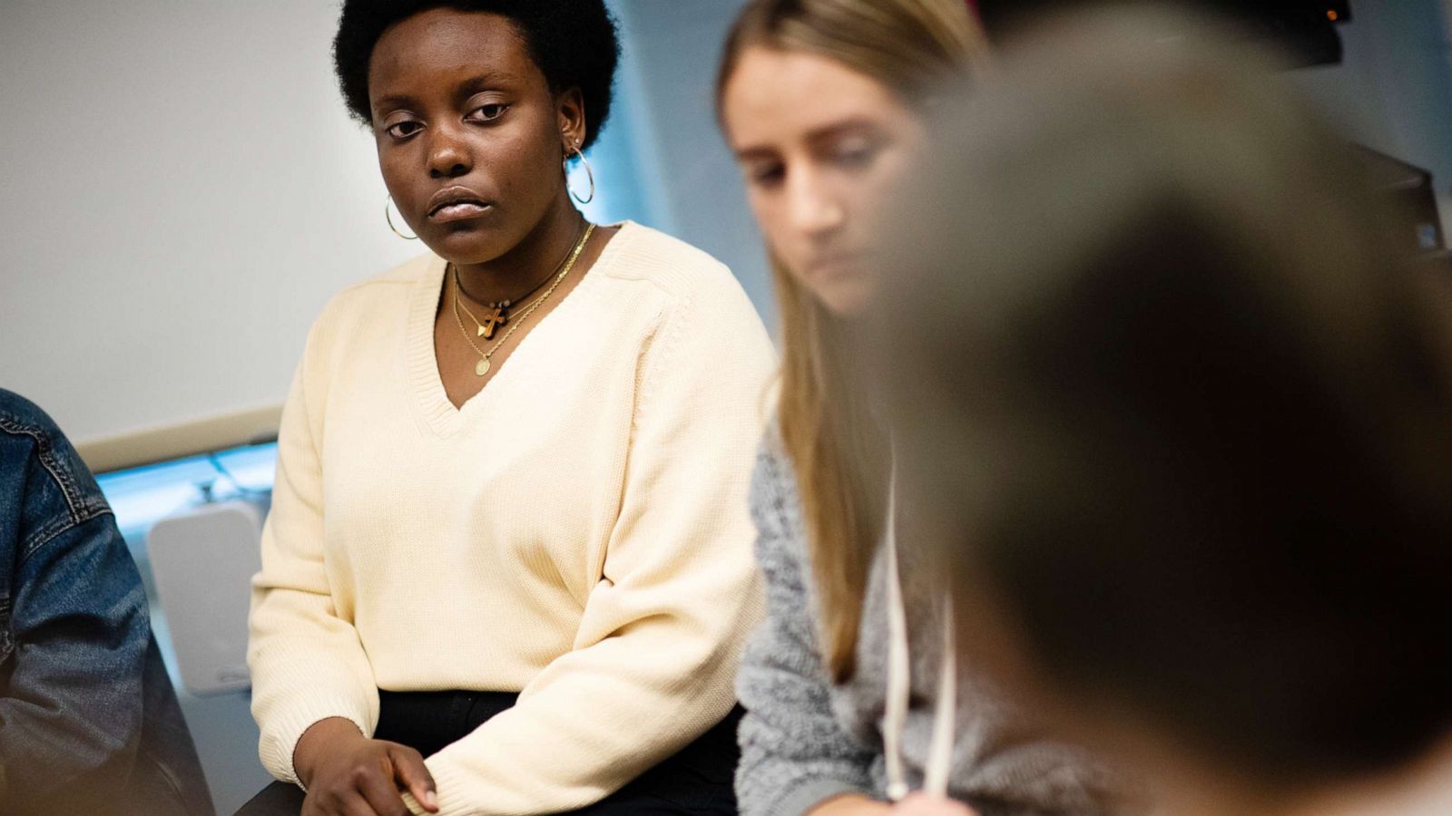 PHOTO: Gloria Karekezi, one of several senior girls who has spoken up about the list, is working on an exhibit about toxic aspects of teen culture at Bethesda-Chevy Chase High School.