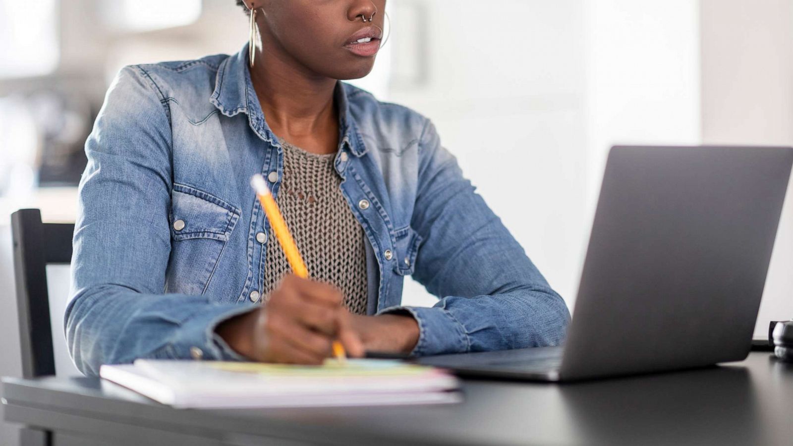 PHOTO: In this undated stock photo a woman works on her computer.