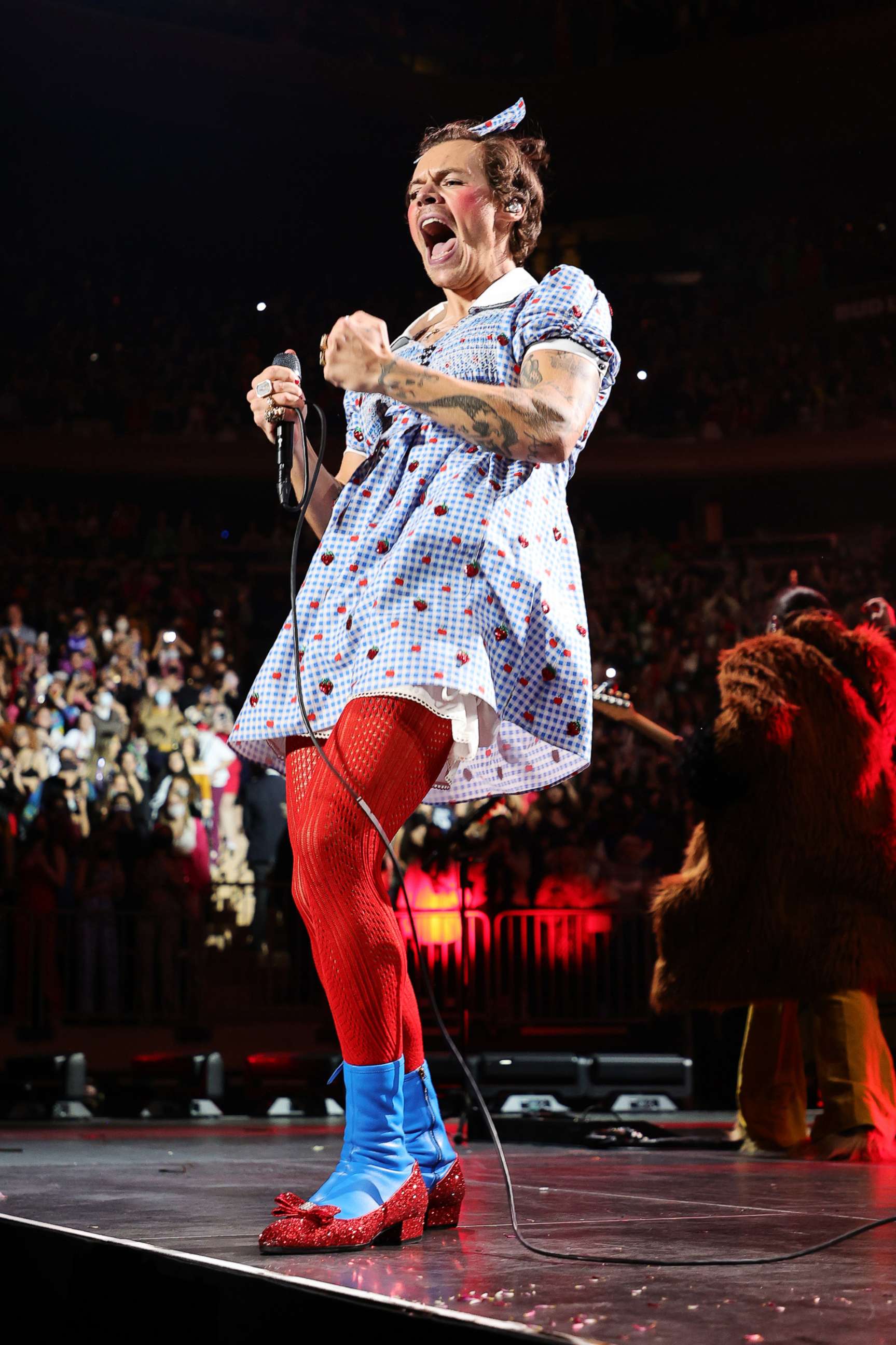 PHOTO: Harry Styles performs onstage in costume at Madison Square Garden, Oct. 30, 2021 in New York City.