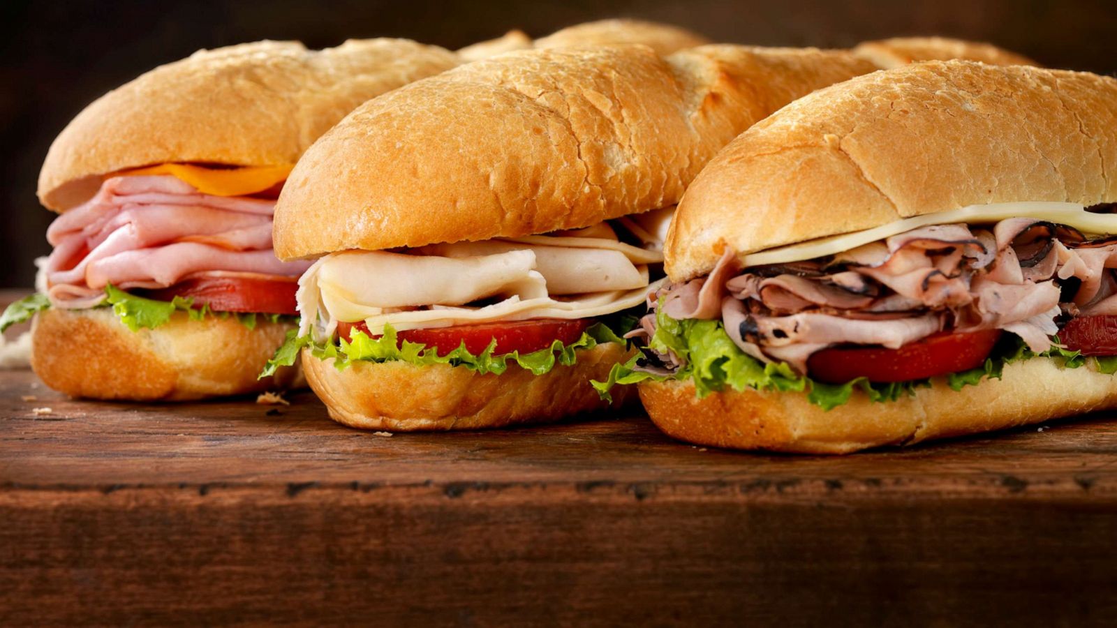 PHOTO: Submarine Sandwiches with deli meats and cheese.