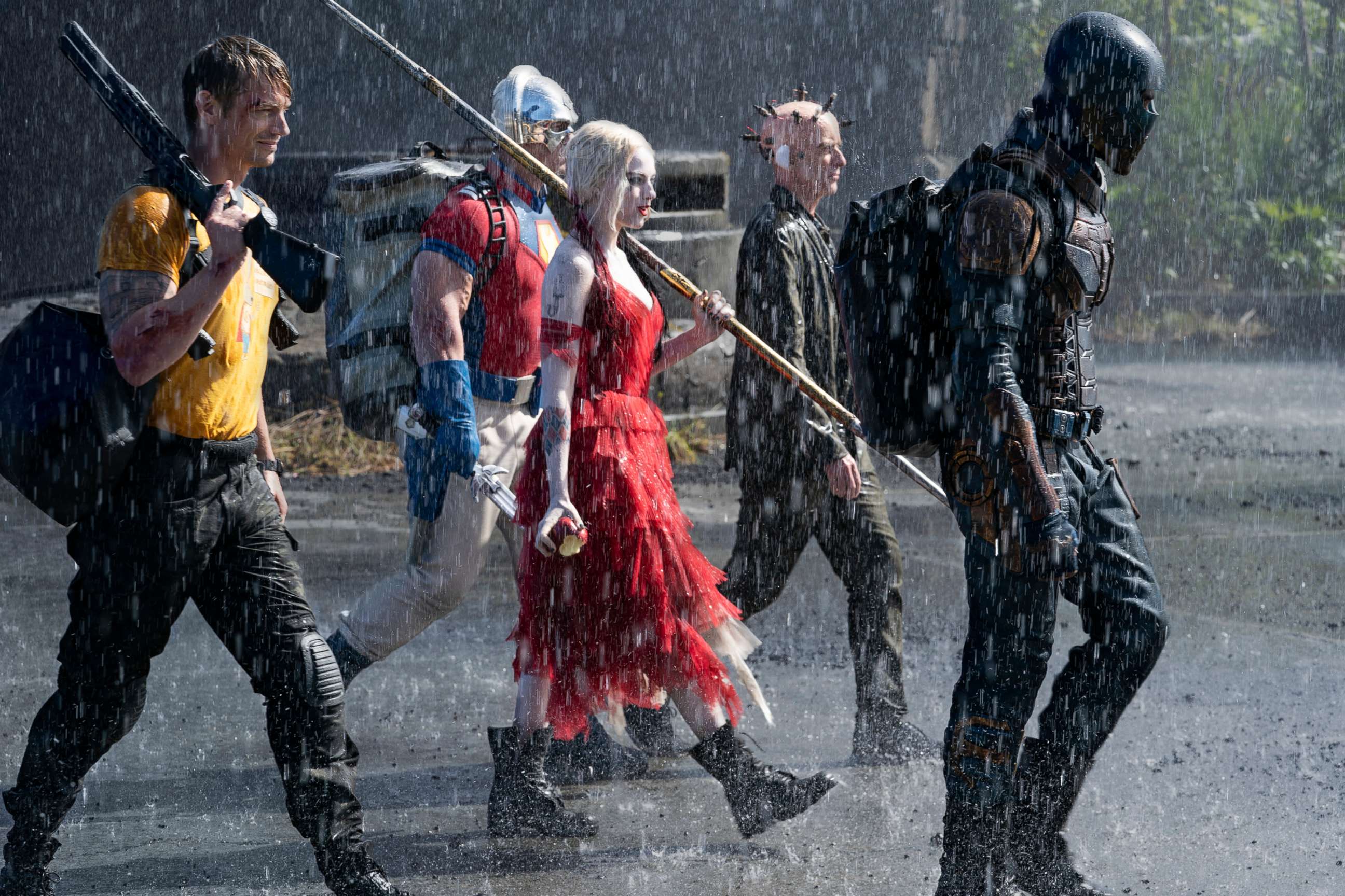 PHOTO: Joel Kinnaman as Rick Flag, John Cena as Peacemaker, Margot Robbie as Harley Quinn, Peter Capaldi as The Thinker and Idris Elba as Bloodsport are shown in Warner Bros. Pictures' action adventure "The Suicide Squad."