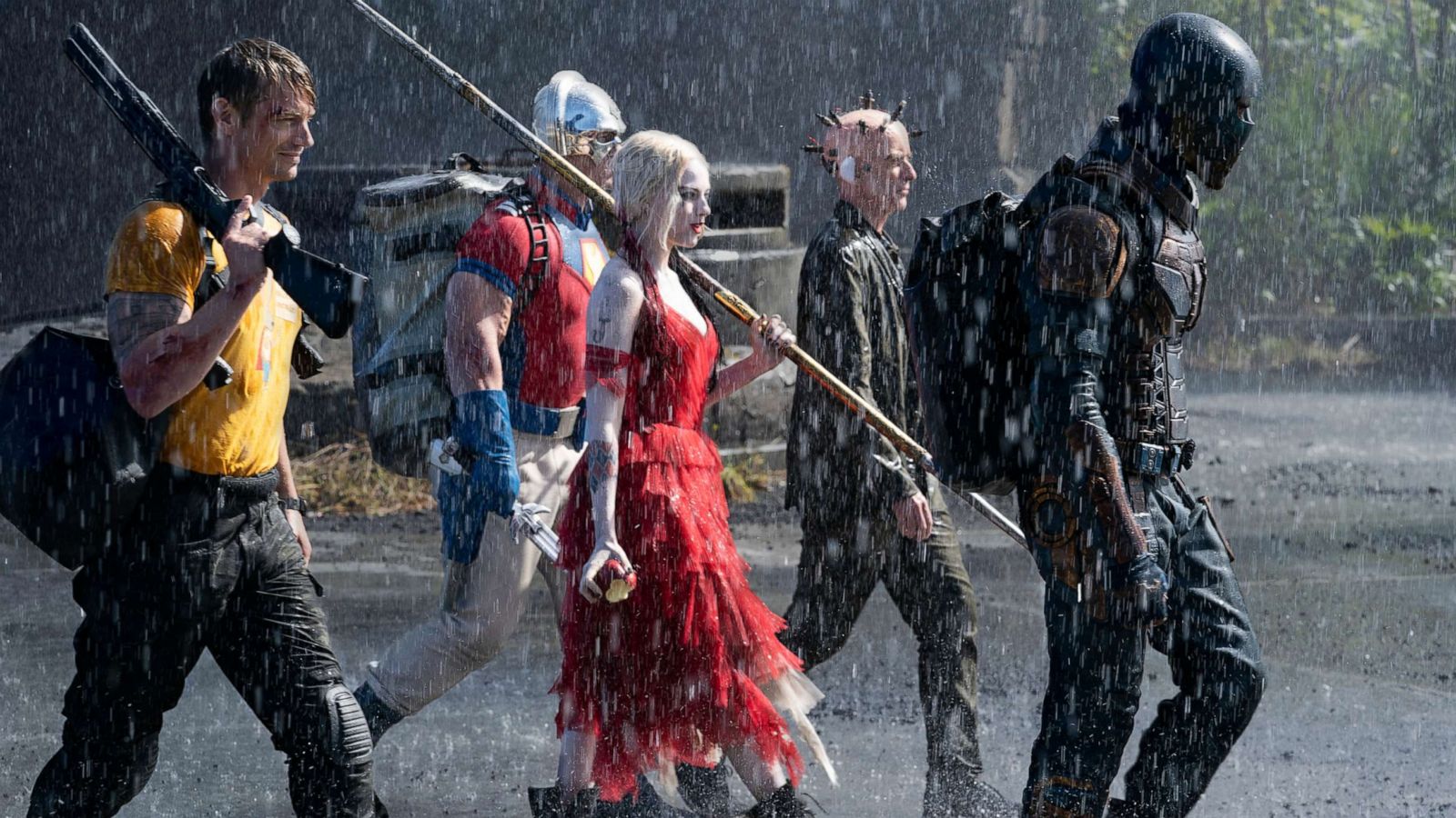 PHOTO: Joel Kinnaman as Rick Flag, John Cena as Peacemaker, Margot Robbie as Harley Quinn, Peter Capaldi as The Thinker and Idris Elba as Bloodsport are shown in Warner Bros. Pictures' action adventure "The Suicide Squad."