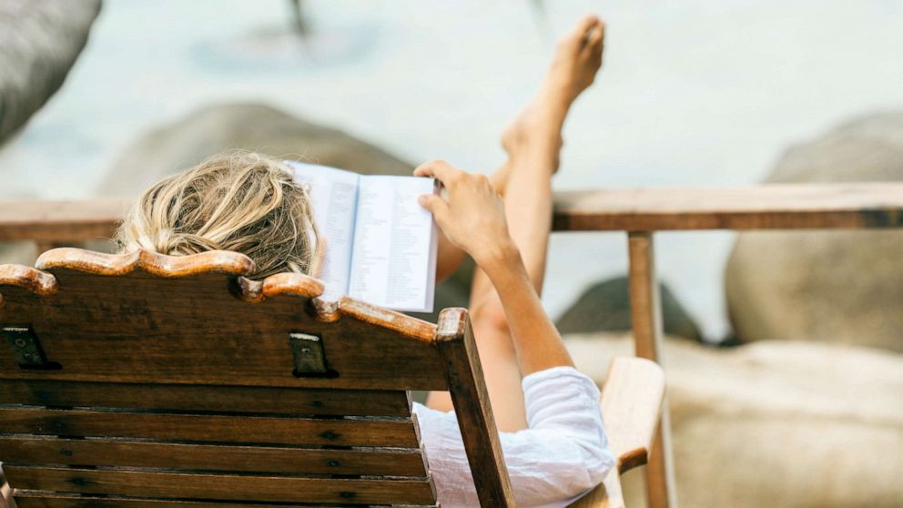 PHOTO: A woman reads in this stock photo.