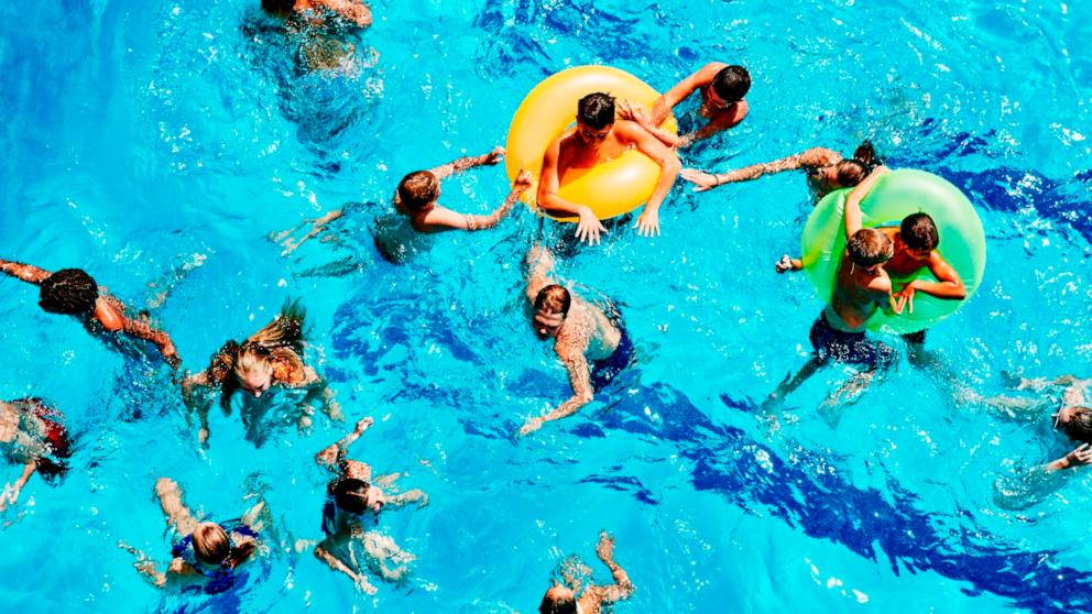 PHOTO: Stock photo of a group of kids playing in a pool.