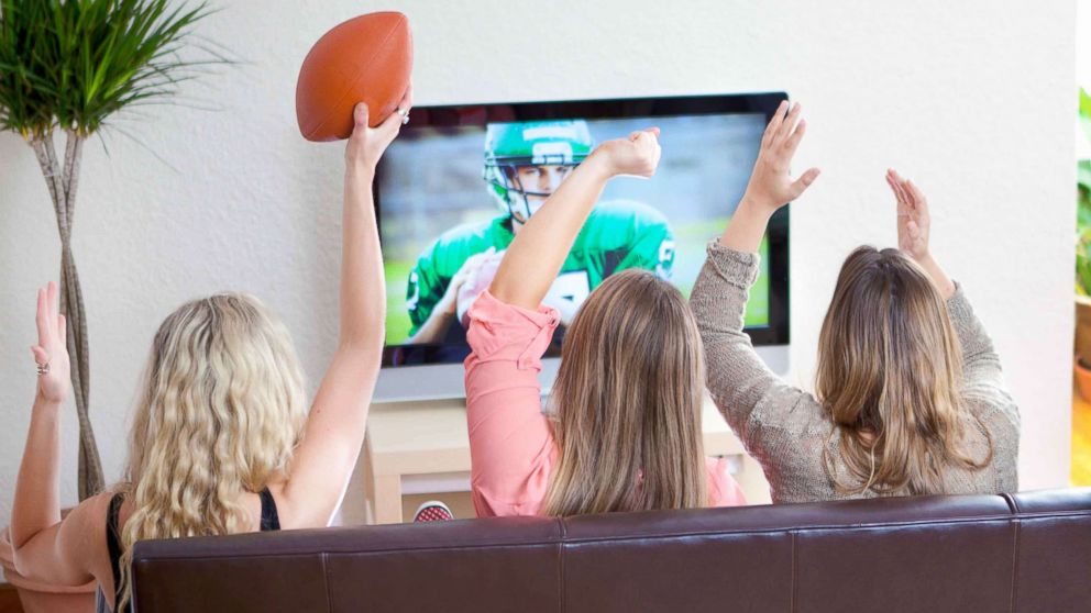 PHOTO: An undated stock photo of women watching a football game. 