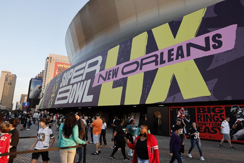 PHOTO: Football fans gather outside during the National Football League's Super Bowl LIX Opening Night event at Caesars Superdome, Feb. 4, 2025, in New Orleans.