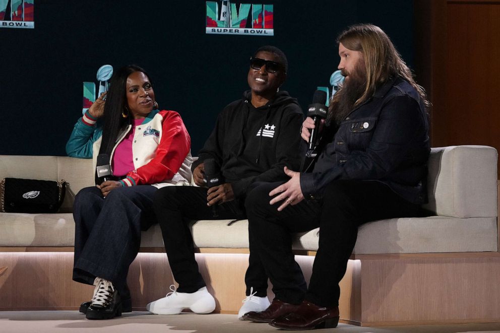 PHOTO: Chris Stapleton speaks with Sheryl Lee Ralph and Kenneth "Babyface" Edmonds during the Halftime Show Press Conference at Phoenix Convention Center, Feb 9, 2023, in Phoenix.