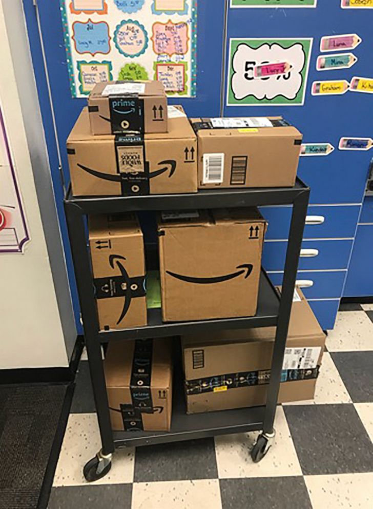 PHOTO: A photo of Amazon boxes is seen inside Elisabeth Milich's classroom at Whispering Wind Academy in Phoenix, Arizona, for a teacher who requested school supplies through Ben Adam, a man from New York who adopts classrooms in Arizona. 