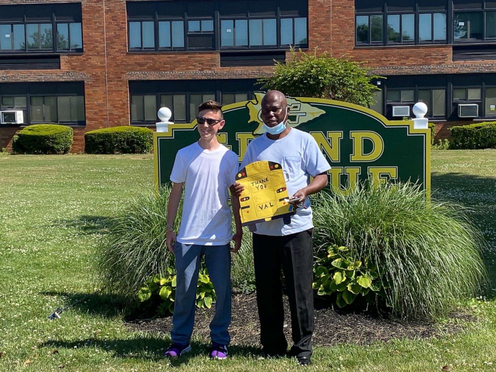 PHOTO: Grand Avenue Middle School graduate Preston Bowman surprised his school bus driver Agustine Val with a $1,000 check from the VING project in Long Island, New York.