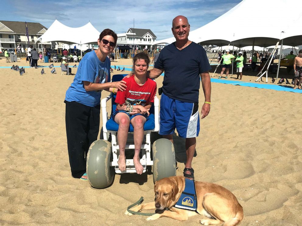PHOTO: Bethy De Tata pictured with her parents Jim and Sue De Tata at the Autism Beach Bash in Belmar, New Jersey.