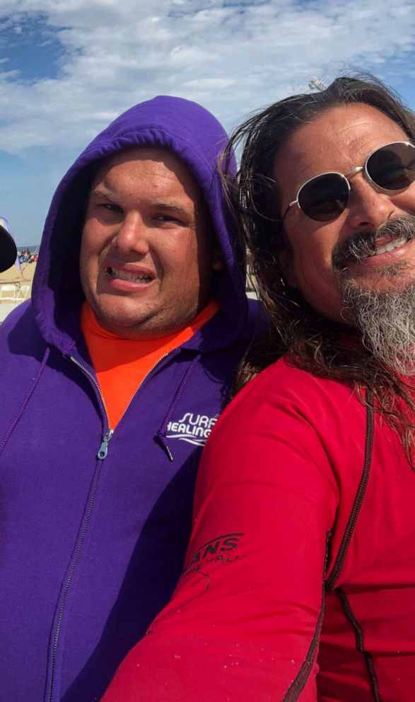 PHOTO: Surfers Healing founder and pro surfer Izzy Paskowitz with his son Isaiah Paskowitz at the Autism Beach Bash in Belmar, New Jersey.