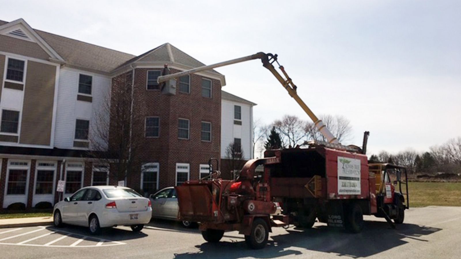 PHOTO: Charley Adams, 45, uses his company's bucket truck to visit his 80-year-old mother quarantined on the 3rd floor of a nursing home in New Middletown, Ohio, March 22, 2020.