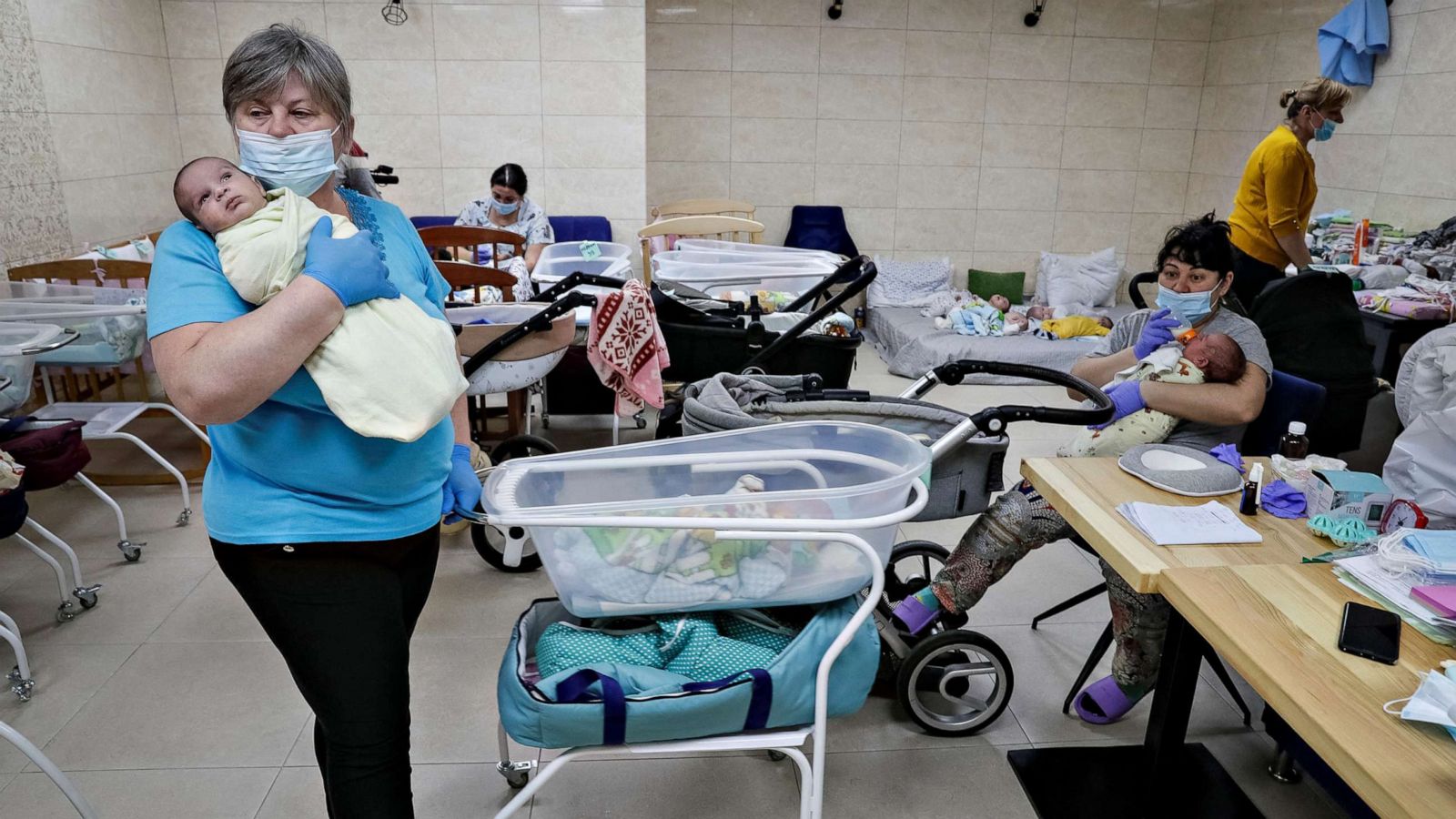 PHOTO: Nurses look after surrogate-born babies inside a BioTexCom clinic shelter in a basement on the outskirts of Kyiv, Ukraine, March 15, 2022.