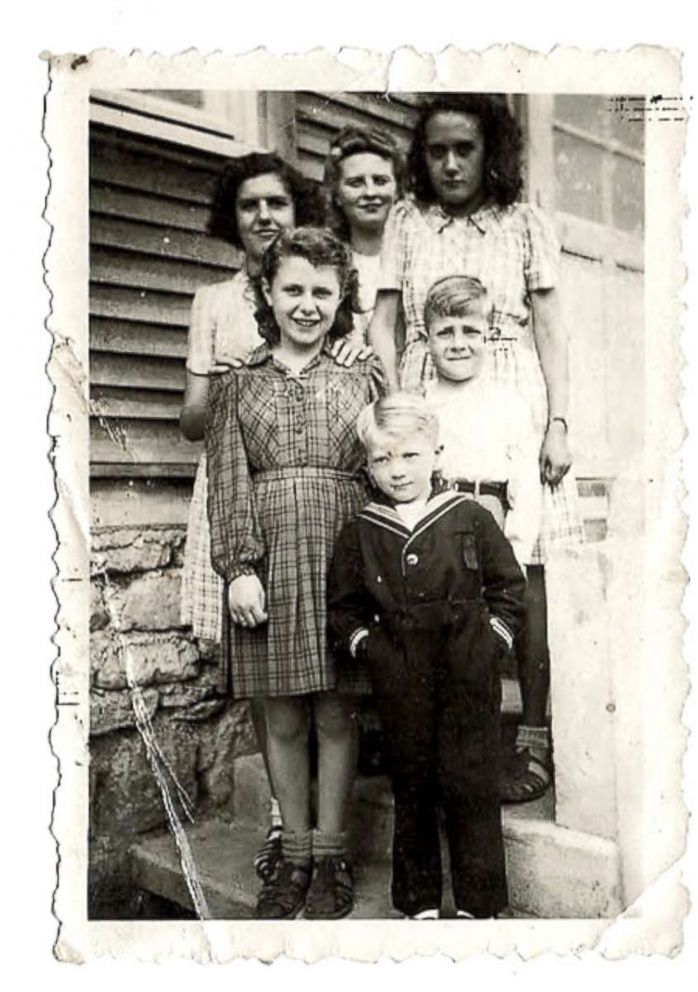 PHOTO: Charlotte Adelman, her brother, Alain Quartreville and the Quatreville family at the Quatreville's home.