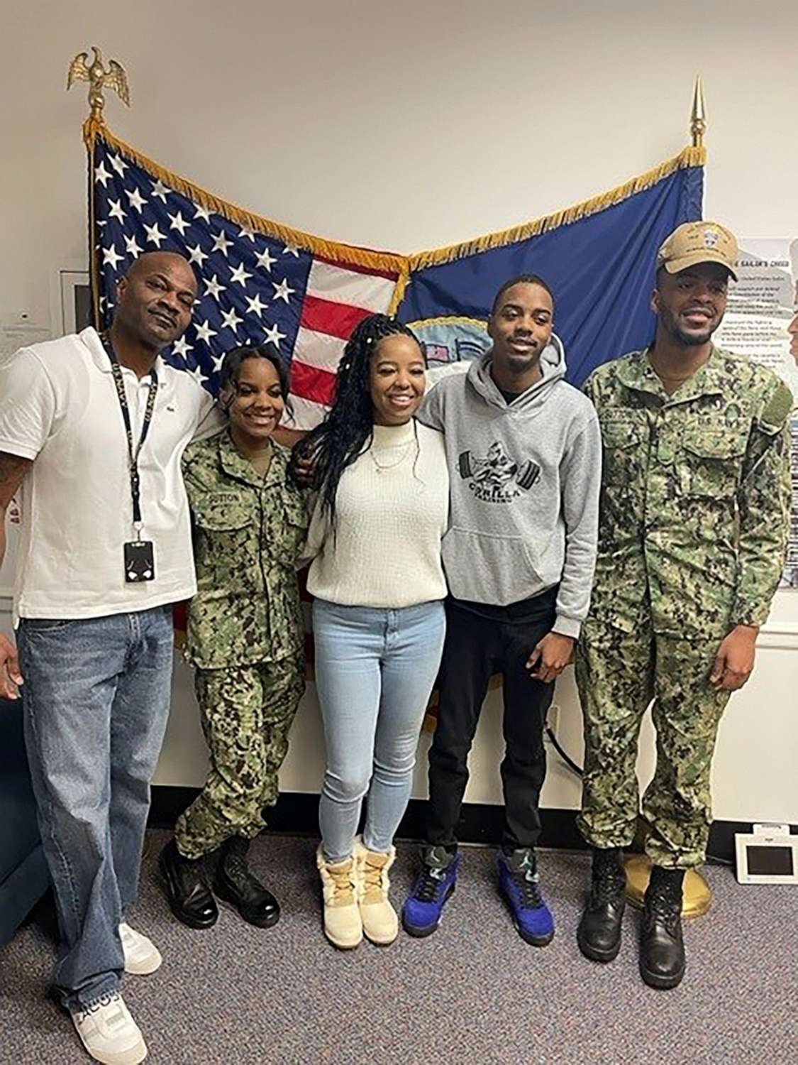 PHOTO: Andrea, Adrion, and Ayrion Sutton are the first Black triplets to enlist in the Navy together.