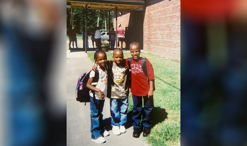 PHOTO: While growing up, the Sutton triplets, pictured attending elementary school, often asked about their parents' experiences serving in the Navy.
