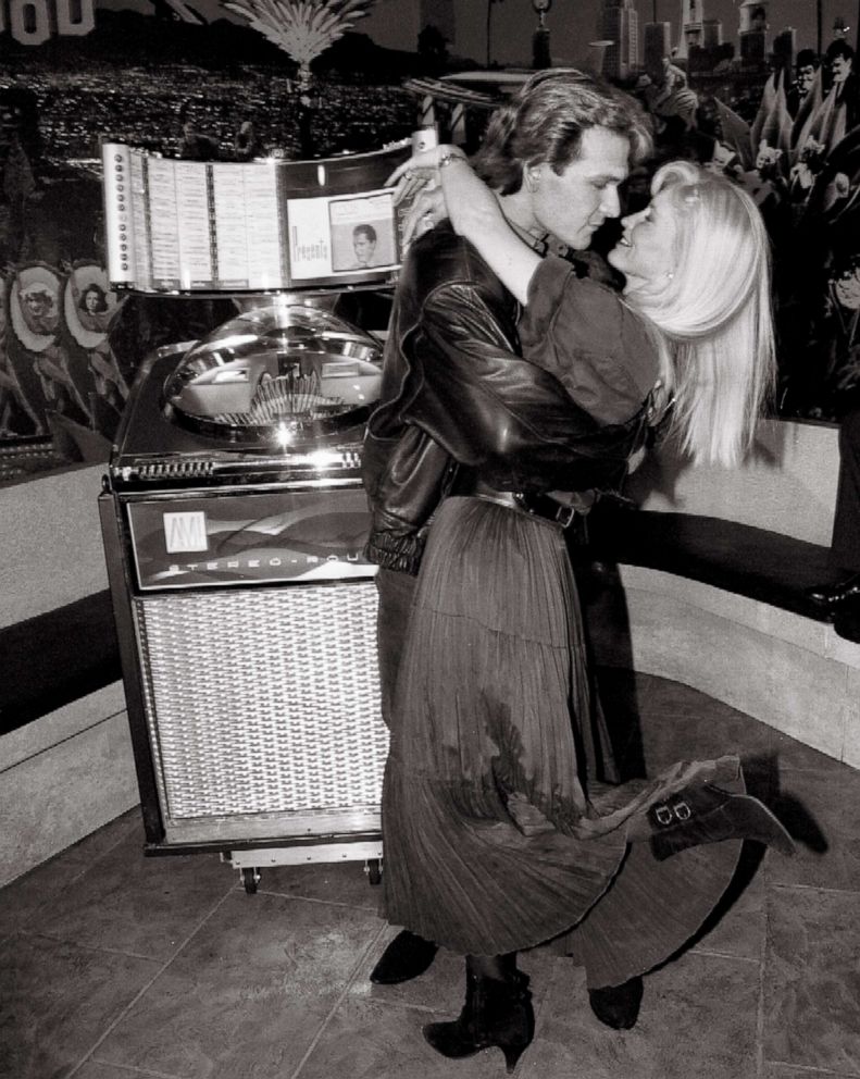 PHOTO: Patrick Swayze dances with wife Lisa Niemi, April 10, 1992, at Planet Hollywood where he presented the jukebox from movie "Ghost" to their collection of movie memorabilia.