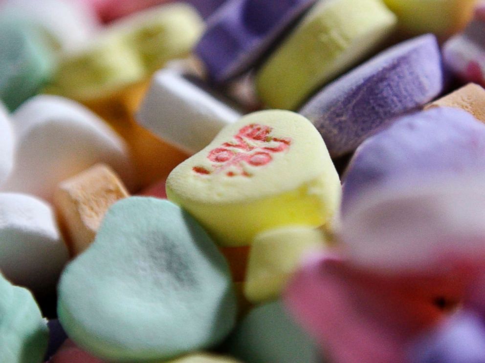 PHOTO: Colored Sweethearts candy is held in bulk prior to packaging at the New England Confectionery Company in Revere, Mass., Jan. 14, 2009.