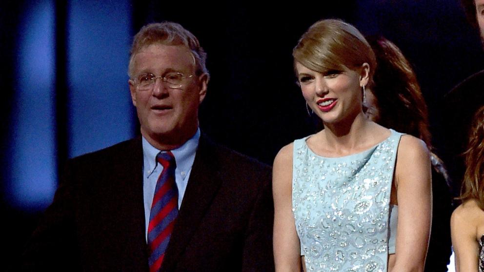 PHOTO: Scott Swift and his daughter, honoree Taylor Swift, attend the 50th Academy of Country Music Awards at AT&T Stadium, April 19, 2015, in Arlington, Texas. 