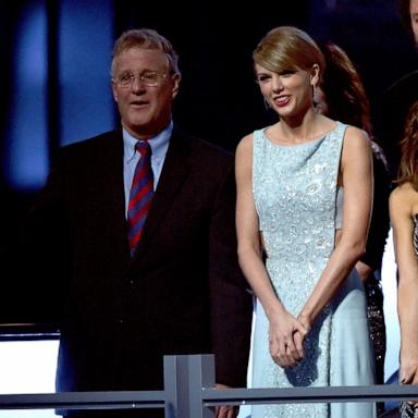 PHOTO: Scott Swift and his daughter, honoree Taylor Swift, attend the 50th Academy of Country Music Awards at AT&T Stadium, April 19, 2015, in Arlington, Texas. 