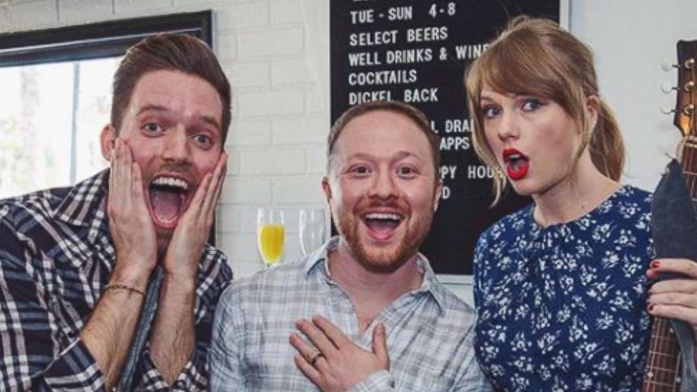 PHOTO: Alex Goldschmidt and fiance Ross Girard pose with Taylor Swift.