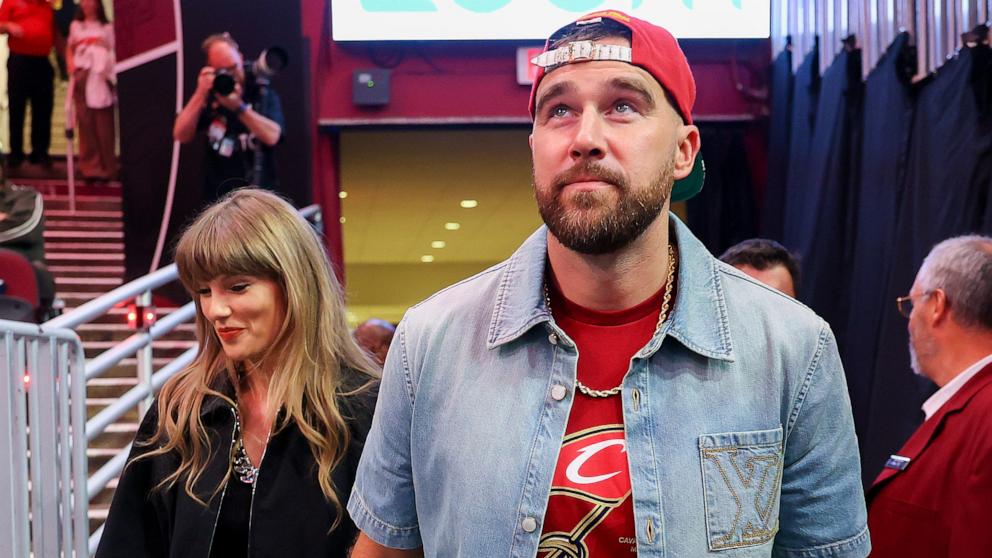 PHOTO: Taylor Swift and Travis Kelce attend Game Three between the New York Knicks and the Cleveland Cavaliers in the NBA Eastern Conference Finals at Rocket Arena on May 23, 2026 in Cleveland, Ohio.