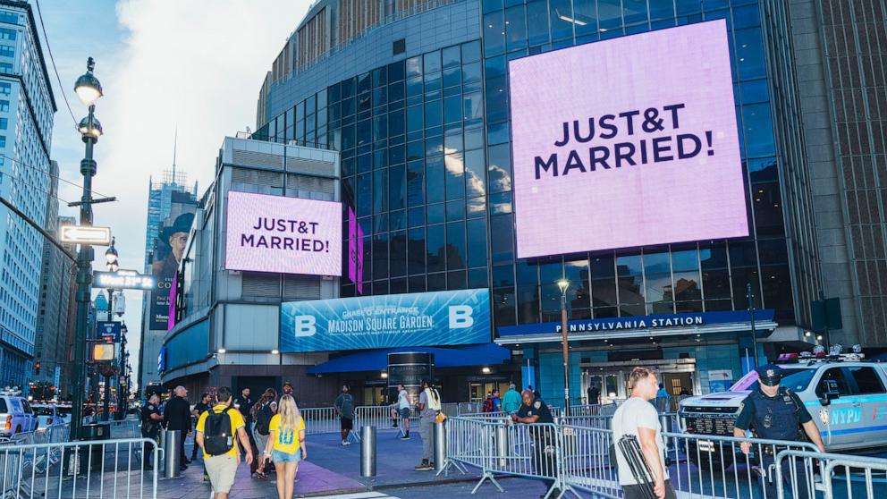 PHOTO: The screens diplay "Just T&T Married!" outside Madison Square Garden in New York, New York on July 3, 2026.