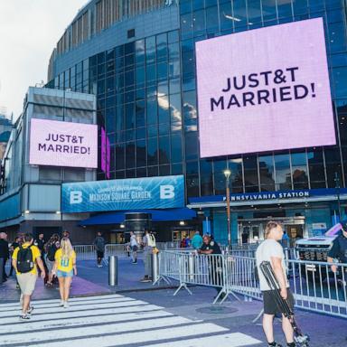 PHOTO: The screens diplay "Just T&T Married!" outside Madison Square Garden in New York, New York on July 3, 2026.