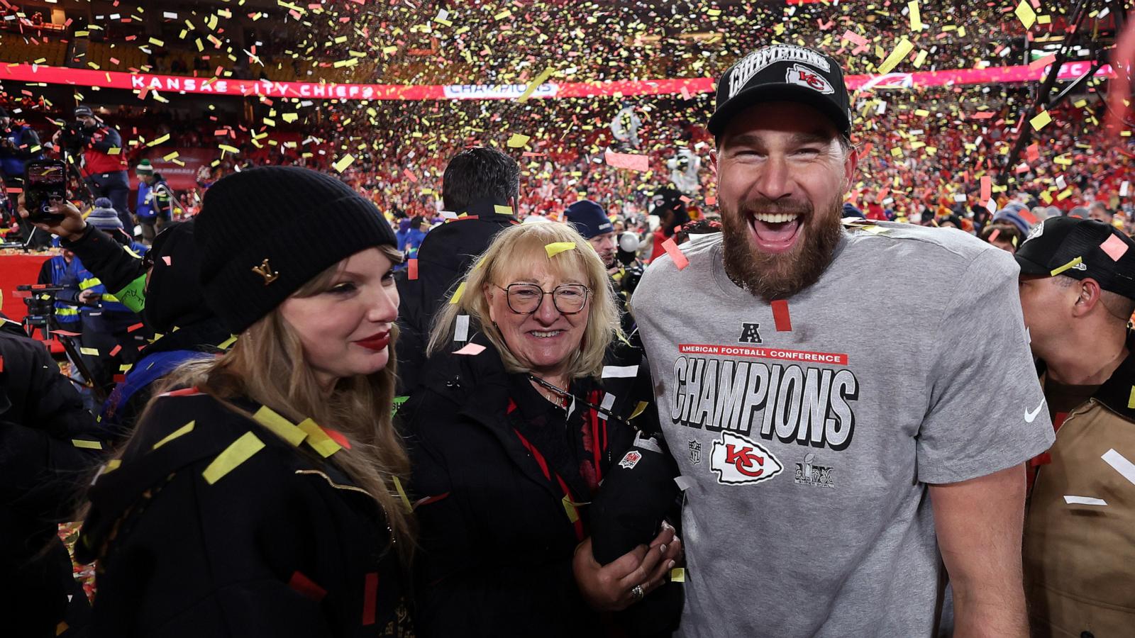 PHOTO: Travis Kelce celebrates with Taylor Swift and mother Donna Kelce after the Chiefs won the AFC Championship Game at GEHA Field at Arrowhead Stadium on January 26, 2025 in Kansas City, Missouri.