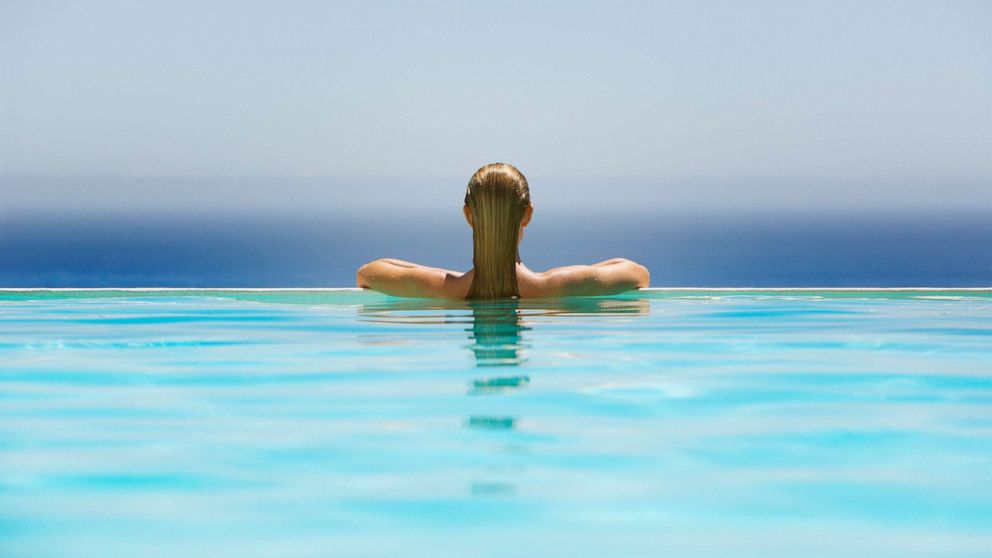 PHOTO: In this undated file photo, a woman stands at the edge of an infinity pool.