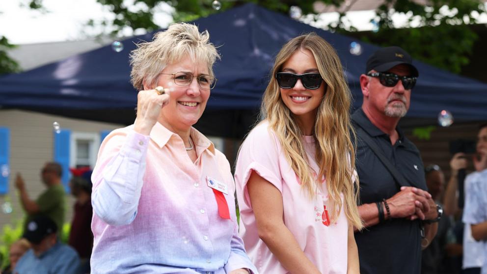 PHOTO: Christy Martin and Grand Marshall actress Sydney Sweeney react to fans during the Parade of Champions, on June 8, 2025, in Canastota, New York.