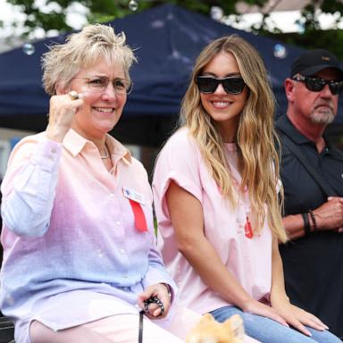PHOTO: Christy Martin and Grand Marshall actress Sydney Sweeney react to fans during the Parade of Champions, on June 8, 2025, in Canastota, New York.