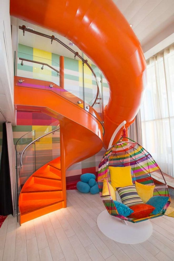 PHOTO: Kids can slide into the perfect adventure on the multistory in-suite slide in the Symphony of the Seas' Ultimate Family Suite. 