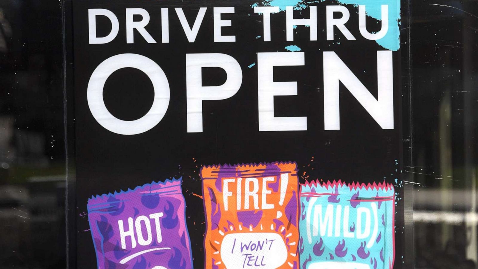 PHOTO: A sign is displayed on a window at a Taco Bell restaurant in Las Vegas, on March 30, 2020.