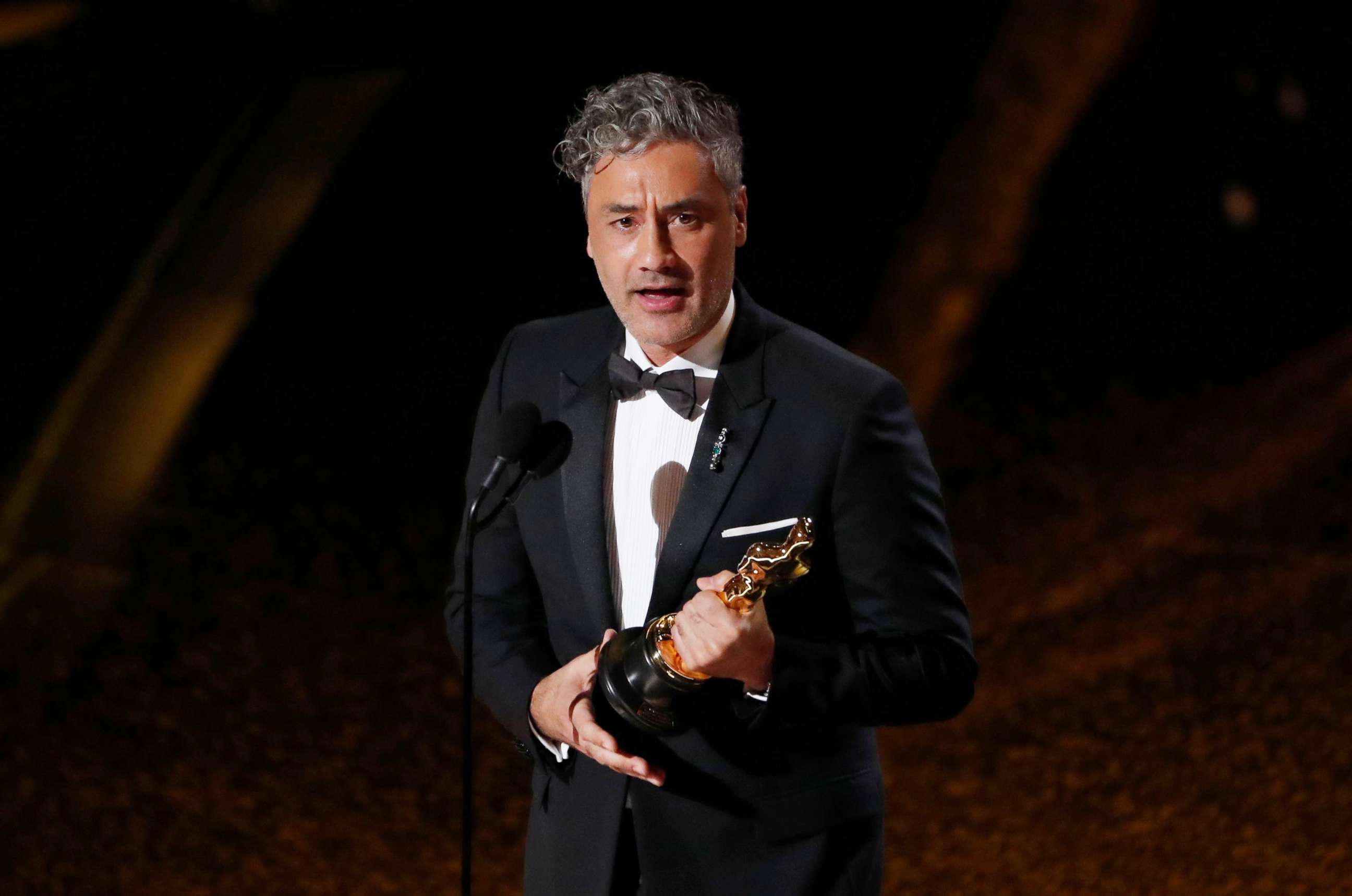 PHOTO: Taika Waititi accepts the award for Best Adapted Screenplay for 'Jojo Rabbit' at the 92nd Academy Awards in Hollywood, Calif., Feb. 9, 2020.