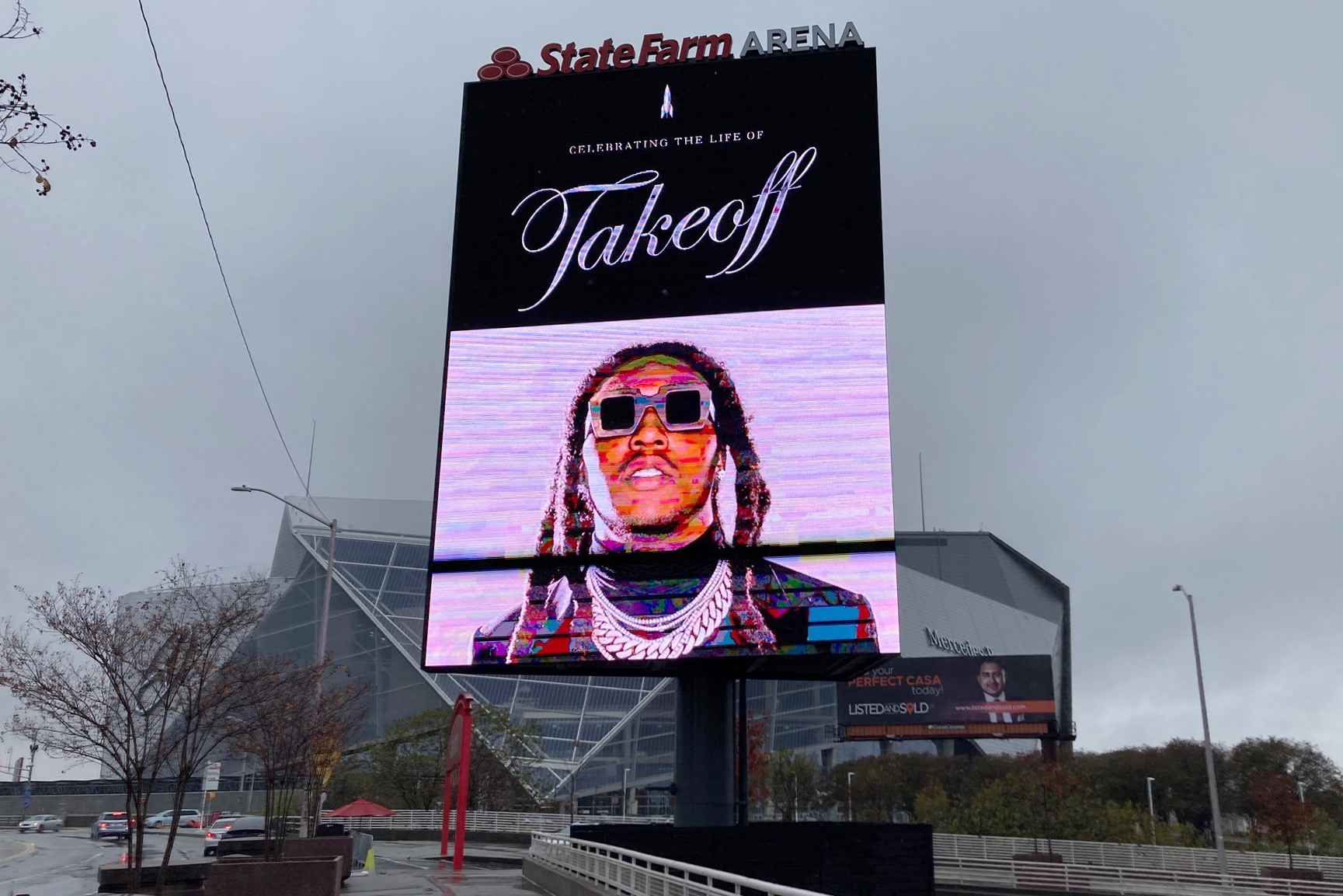 PHOTO: A sign announces the memorial service for slain rapper Takeoff at Atlanta's State Farm Arena on Nov. 11, 2022. He was a member of the hip-hop trio Migos.