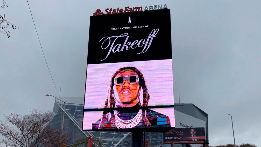 PHOTO: A sign announces the memorial service for slain rapper Takeoff at Atlanta's State Farm Arena on Nov. 11, 2022. He was a member of the hip-hop trio Migos.