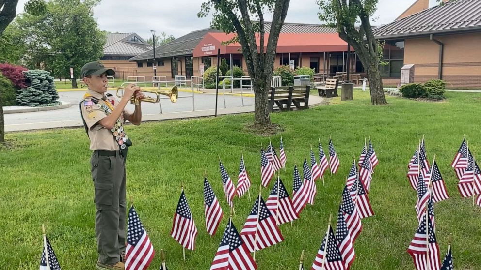 PHOTO: Alex Saldana, 13,  plays "Taps" outside a New Jersey nursing home for veterans every night since April 8th.